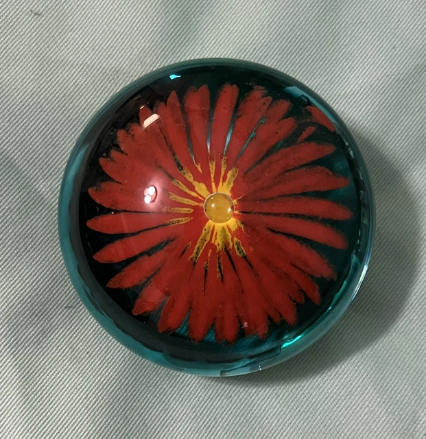 Stunning Orange Sunflower Wit Yellow Center In Reflective Blue Glass Paperweight