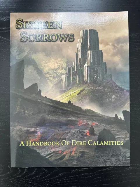 Godbound - Sixteen Sorrows: A Handbook of Calamities - Softcover, POD, neu