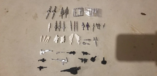 Lot of G1 Transformers missiles rockets guns and accessories Lot of G1 Transformers missiles rockets guns and accessories