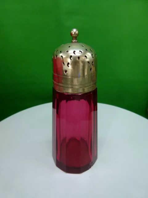 Antique cranberry glass sugar shaker, sifter with silver plated top
