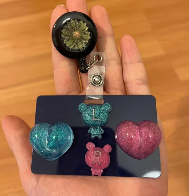 two sets of x-ray markers, with badge reel and buddy