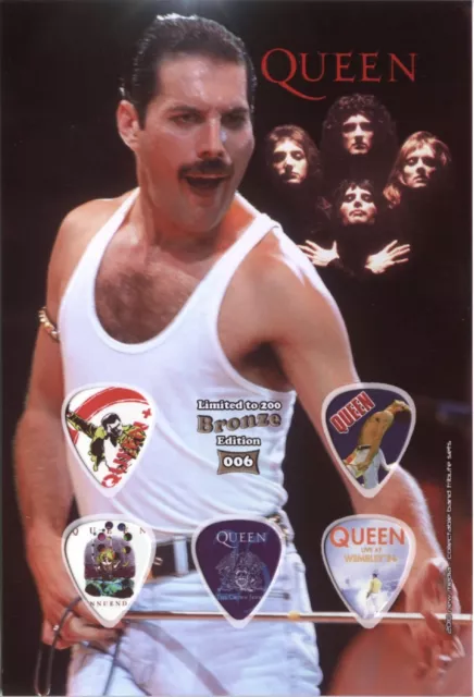 Freddie Mercury Queen Guitar Picks On Photographic Background 5 Guitar Picks