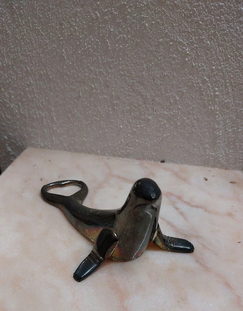 APRIBOTTIGLIE VINTAGE A FORMA Di Foca