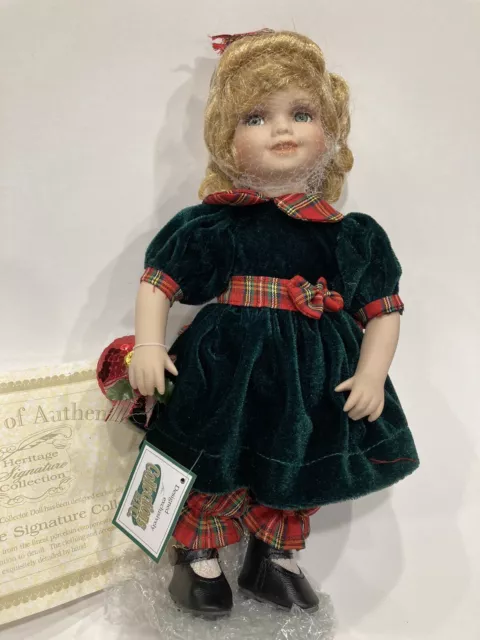 HERITAGE SIGNATURE COLLECTION porcelain Christmas doll “ Rachael” with COA new