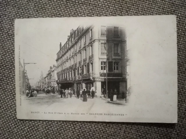 Cpa Nancy La Rue Saint Jean Et La Maison Des Galleries Nanceiennes