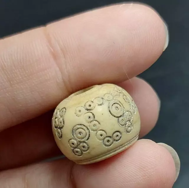 Ancient shell carved spindle whorl bead dice Multiple eyes  gambling amulet bead
