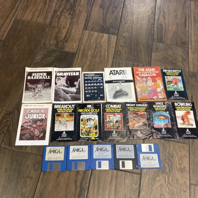 Lot of 11 Atari 2600 Manuals/1 IntellivisionManual/1 Atari Catalog/AmigaMagazine