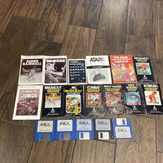 Lot of 11 Atari 2600 Manuals/1 IntellivisionManual/1 Atari Catalog/AmigaMagazine