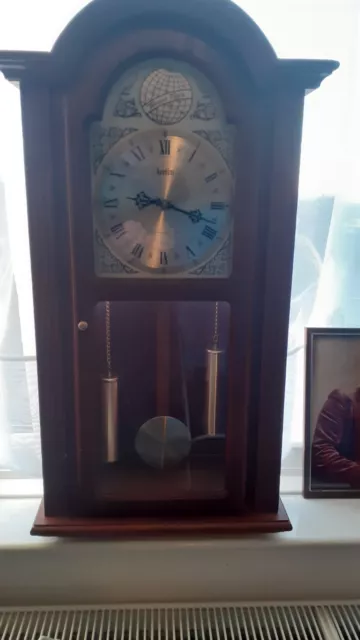 wooden wall clock with pendulum