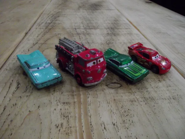 Disney pixar Cars MCQUEEN ,RAMONE X2 AND RED diecast cars 1;55
