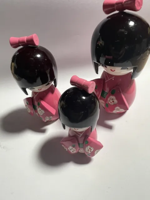 Three Sister Japanese Wooden Dolls In Pink Kimono