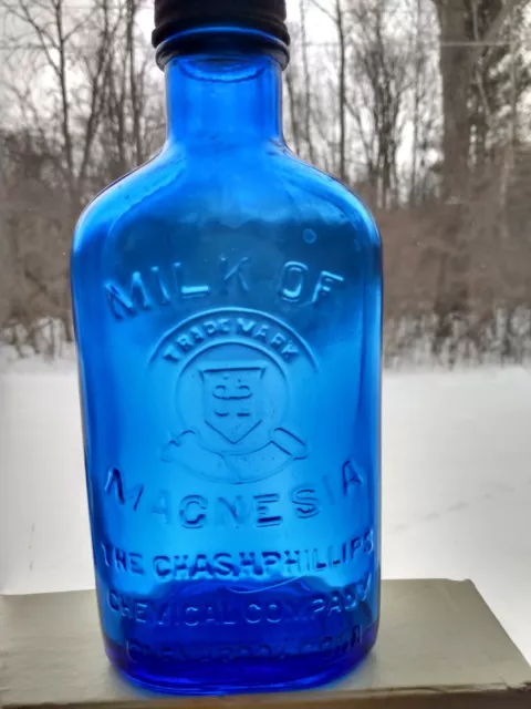 Vintage Embossed Cobalt Blue Glass Bottle Phillips Milk of Magnesia