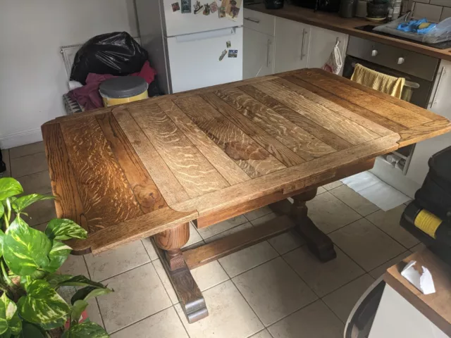 Antique extendable oak dining table (and chairs)