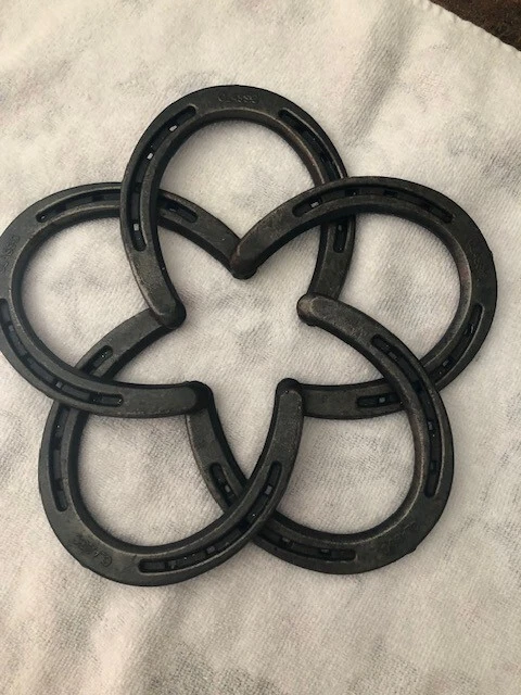 Horse Shoe star pattern cast iron trivet for kitchen or decor