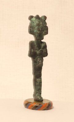 Ancient Egyptian Bronze Osiris figure standing on a Roman Glass bead