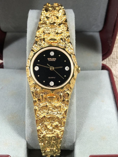 Gruen diamond gold nugget watch top