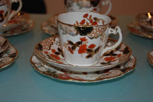 China Tea Cups, Saucers And 2 Plates Decorative And Pretty