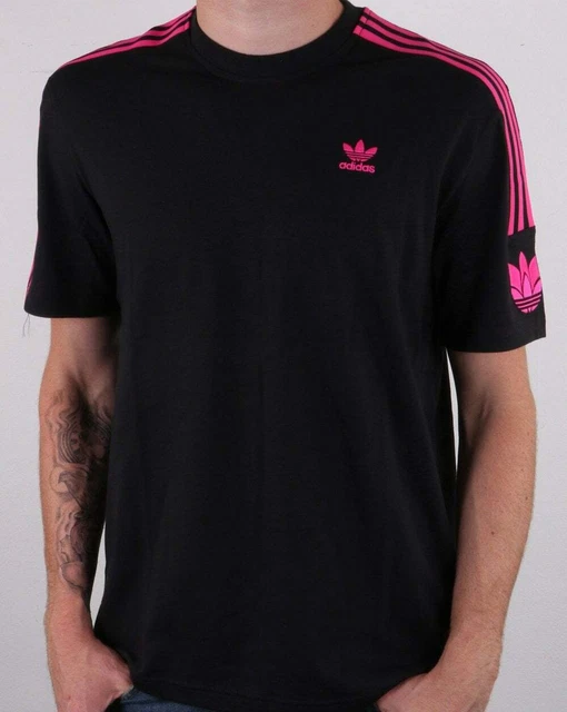 Pink adidas top hotsell with black stripes