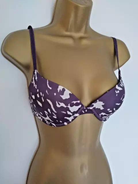 https://www.picclickimg.com/jlcAAOSwaNJkUTT5/Calvin-Klein-purple-padded-underwired-bra-size-32D.webp