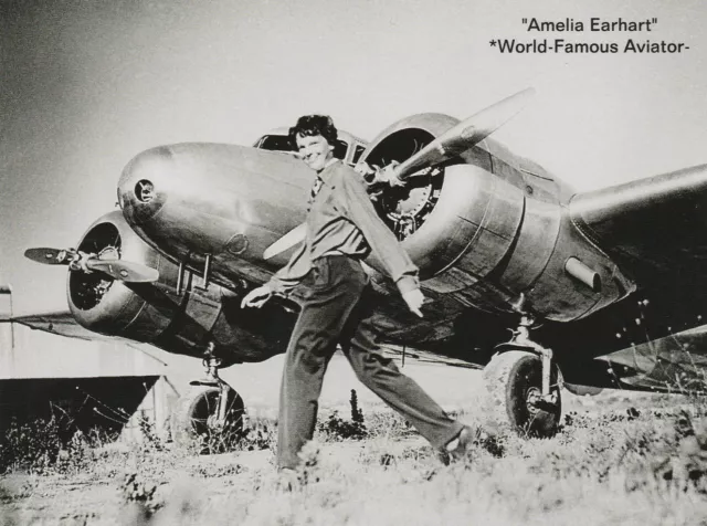 *Postcard-"World-Famos Aviator Amelia Earhart--Smiles & WalkFront of Plane-S-2