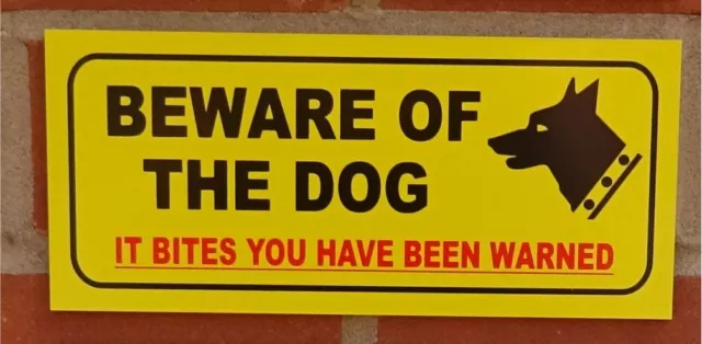 Beware of the dog it bites you have been warned sign - All Materials - Yellow