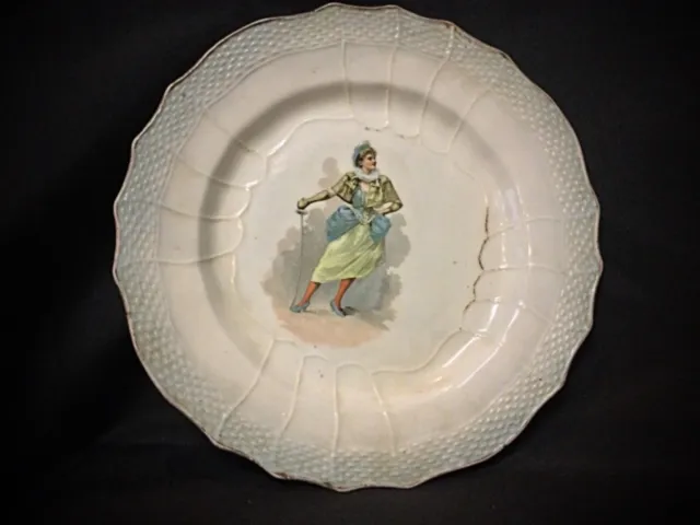 Ancienne assiette XXème ou avant en faïence "Hamage nord" " Femme avec une épée"