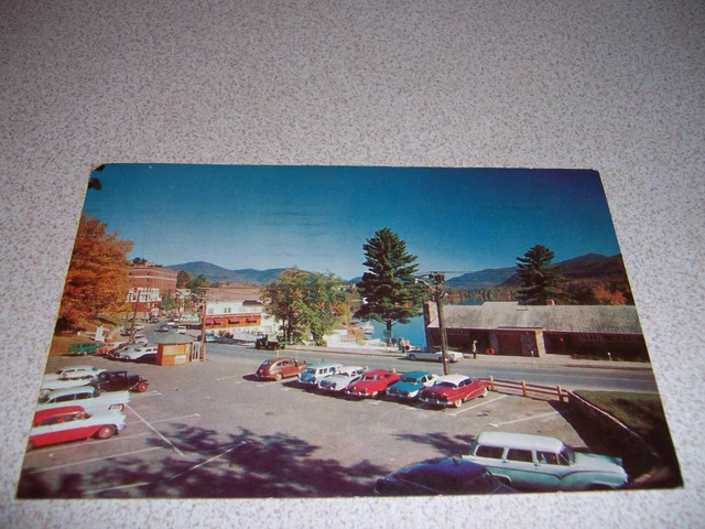 1950s MAIN STREET SCENE DOWNTOWN LAKE PLACID NY. VTG POSTCARD