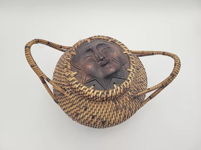 Vintage Indonesian Lombok Island Coiled Rattan Basket Decorated with Wooden Sun