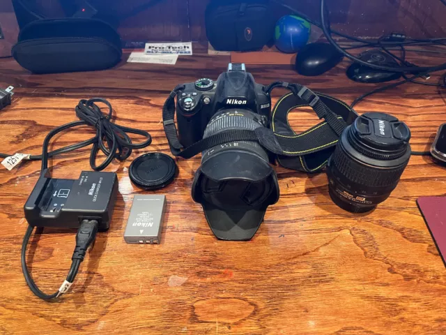 Nikon D3000 10.2MP Digital SLR Camera 18-55mm & 55-200mm lens and more, preowned