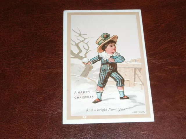 Original  Victorian Embossed Greetings Card - Young Boy Snowballing.