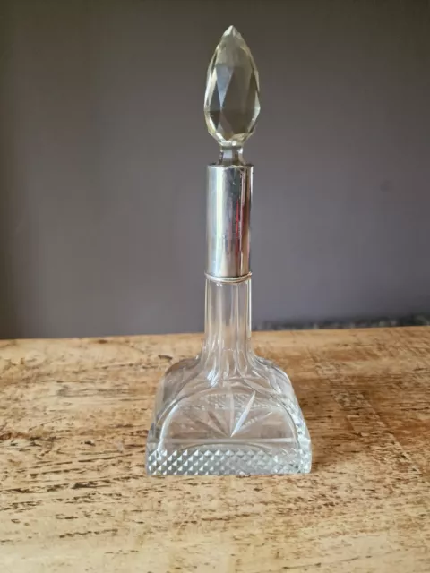 Elegant Cut Glass Bottle With Silver Collar