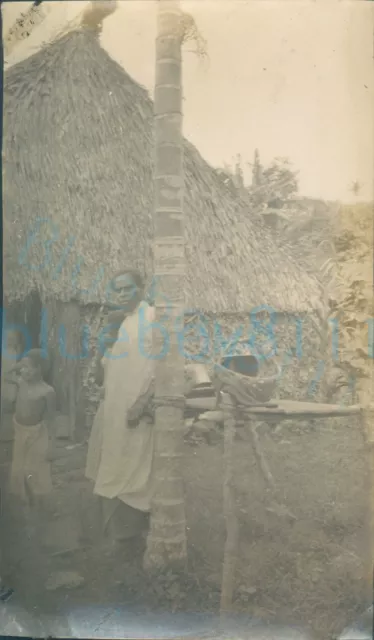 1924 Empire Cruise Photo Native house and family Suva Fiji 4.2x2.4"