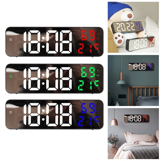 Orologio da parete digitale con ampio display LCD che mostra ora, data, temperatura, umidità, con funzione sveglia e diverse opzioni di installazione (nero