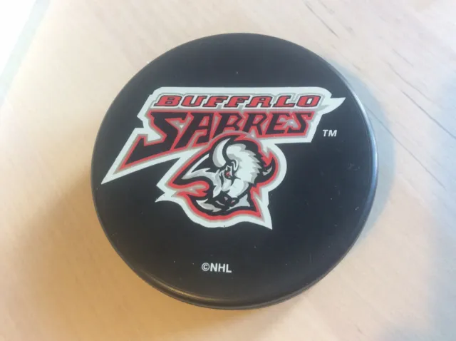 https://www.picclickimg.com/jxMAAOSw0WFliw6Z/Vintage-NHL-Buffalo-Sabres-Official-Ice-Hockey-Puck.webp