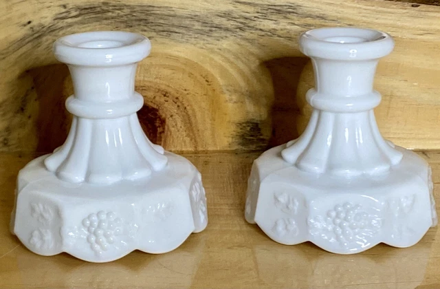 A Pair Of Westmoreland Taper Candle Holders Paneled Grape White Milk Glass 4”