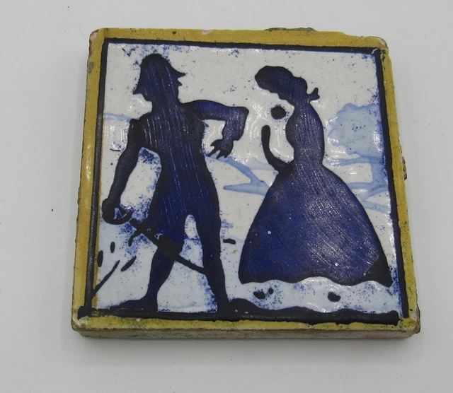 Vintage ceramic tile painted silhouette blue figures military man/woman