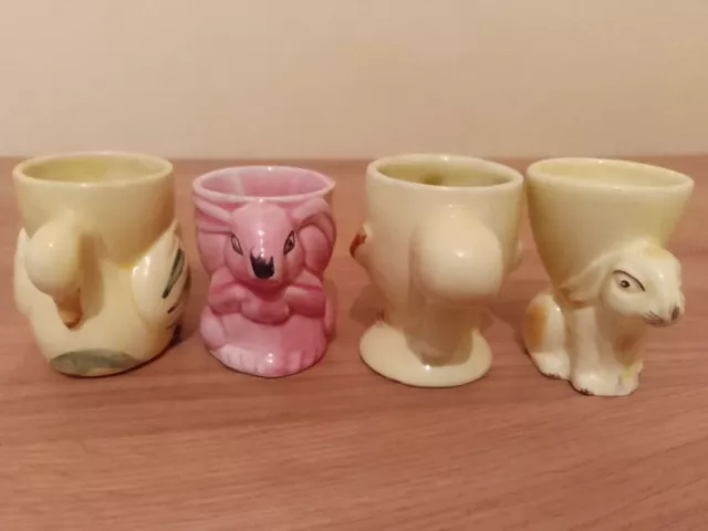 4 Vintage Ceramic Egg Cups,Swan Duck And Two Rabbits.