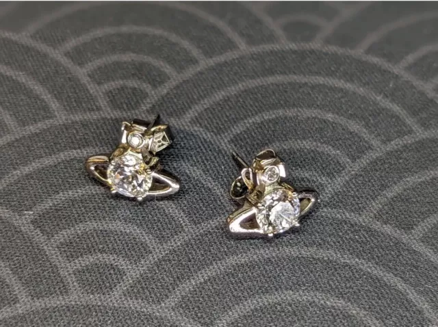 VIVIENNE WESTWOOD silvertone Reina crystal solitaire orb earrings. Brand New!