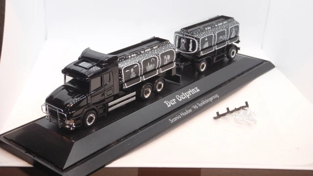 HERPA - MAN TGX GX 4x2 con rimorchio telonato 3 assi TLP - BAUMIT - 1 HERPA - MAN TGX GX 4x2 con rimorchio telonato 3 assi TLP - BAUMIT - 1