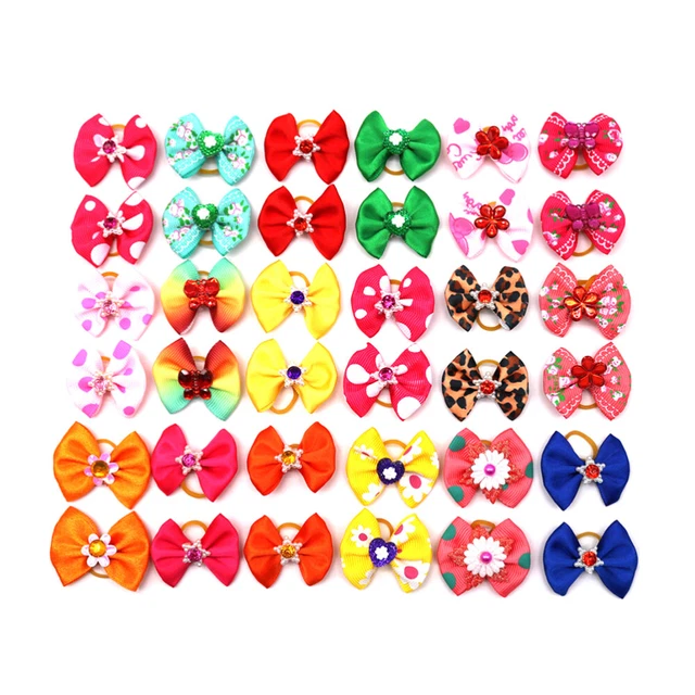 20 piezas Hermoso Bowknot Mascota Tocados Cinta elástica para el pelo de perro Cachorros Ha