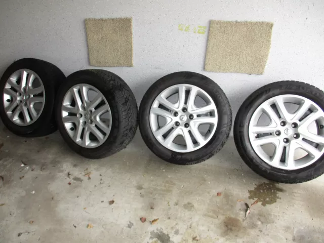 Winterräder Opel Astra K:  205/55 R16 mit Opel-Radkappen