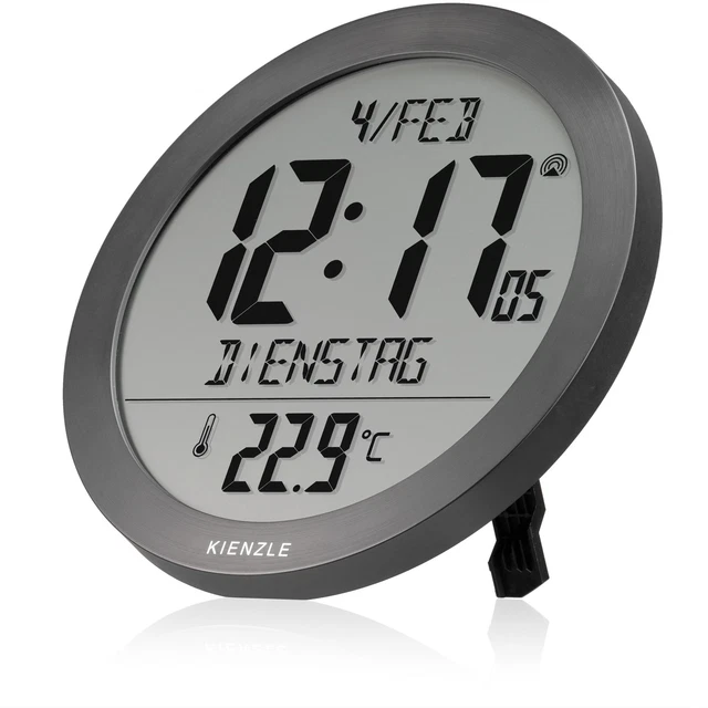 Horloge murale radio-pilotée avec date entourage gris argenté Horloge murale radio-pilotée avec date entourage gris argenté