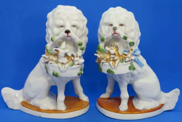 Porcelain vintage Victorian antique pair of poodle dogs with piglets figurines