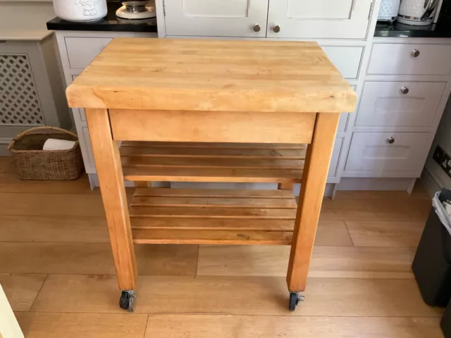 Kitchen wooden butchers block on wheels, with shelves and drawers