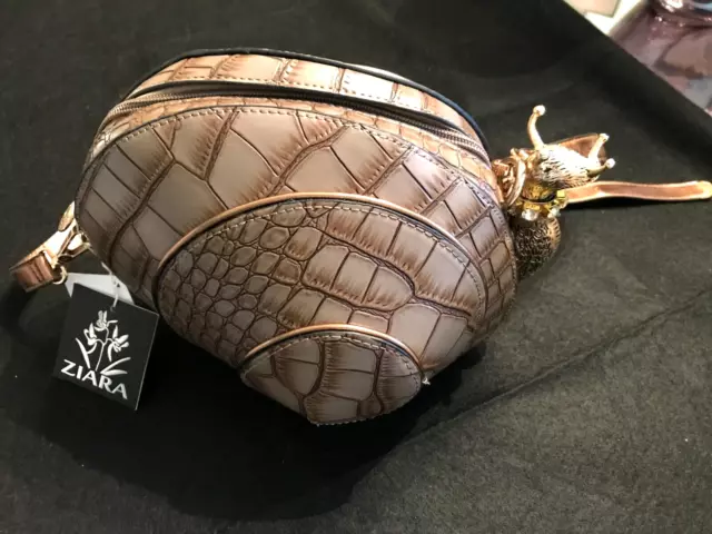 Unique snail shaped handbag new with tag Unique snail shaped handbag new with tag
