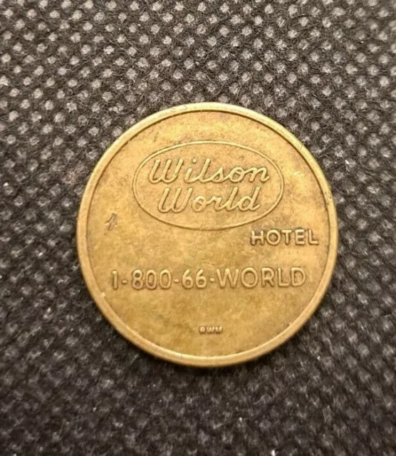 WILSON WORLD HOTEL WALLY TOKEN!   e2553UXX