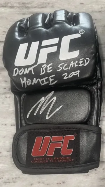 Nick Diaz Autographed Glove With JSA Authentication