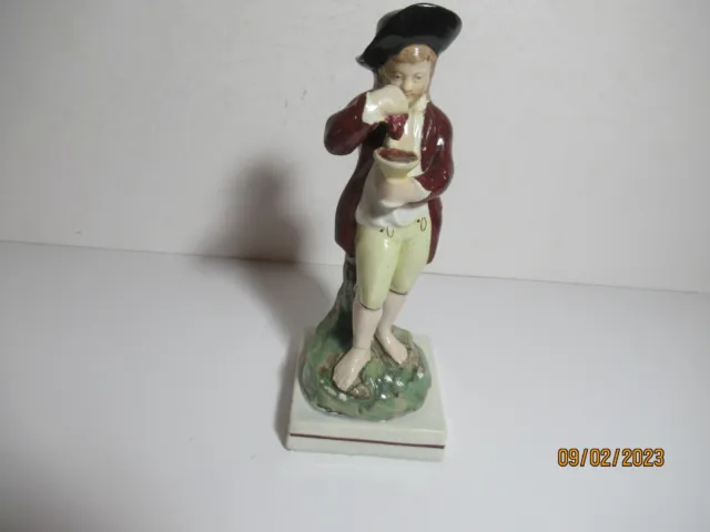 Antique English Staffordshire Young Boy Eating Bunch of Grapes Mid-19th cent.