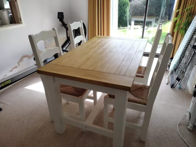 Wooden dining table with 4 chairs - used