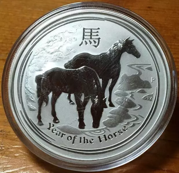 2014 $1 YEAR OF THE HORSE...1 OZ SILVER LUNAR ISSUE..in CAPSULE.